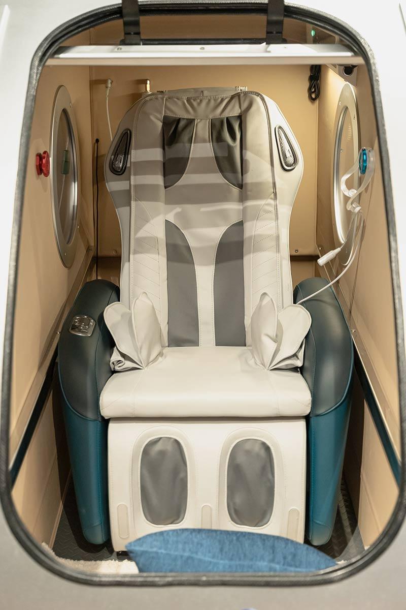 The massage chair inside the chamber